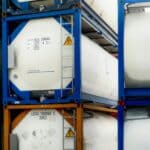 Chemical tank container. ISO tank container for chemical delivery. Bulk liquid transport. Chemical